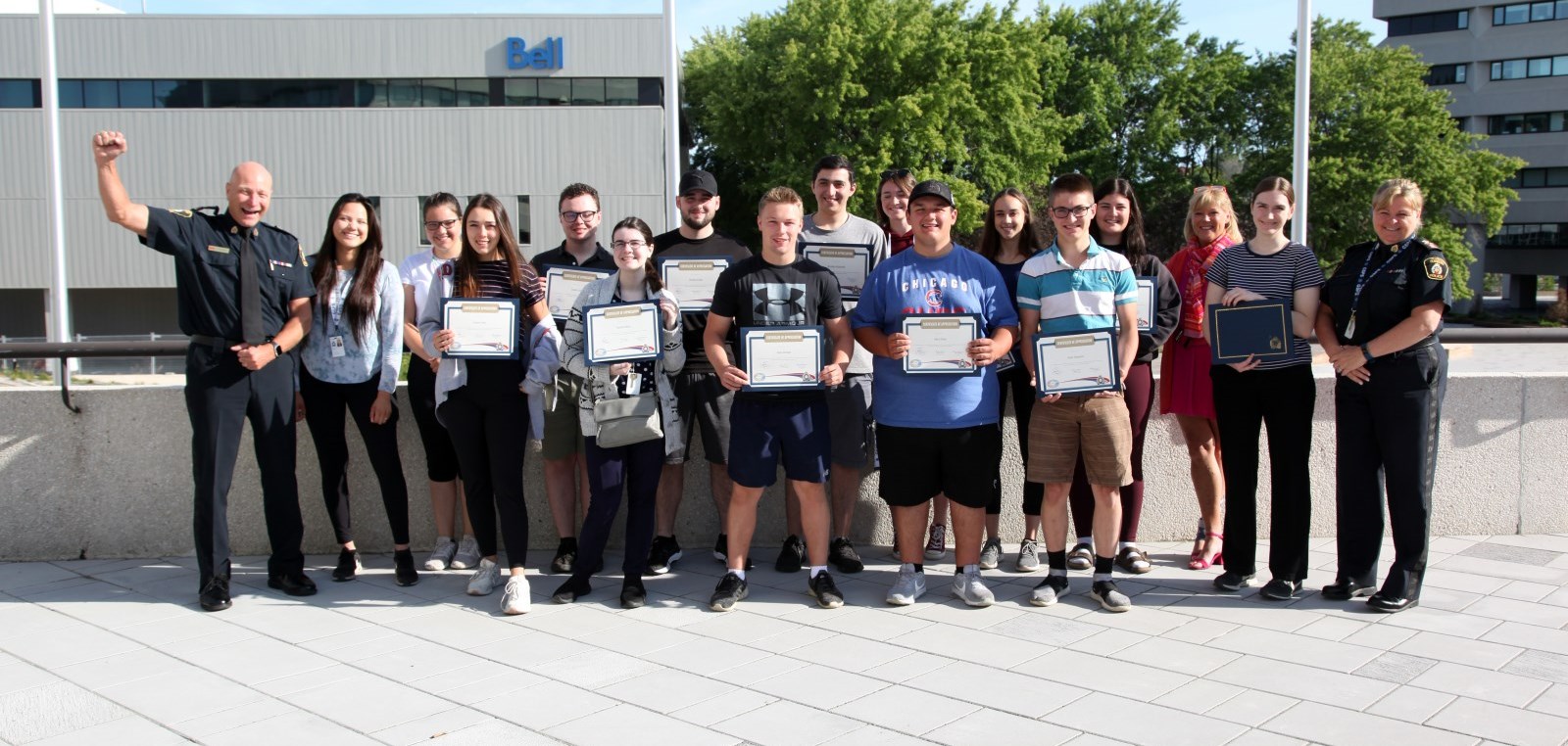 summer students standing with their completion certificates
